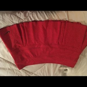 Red Nike pleated tennis skirt.